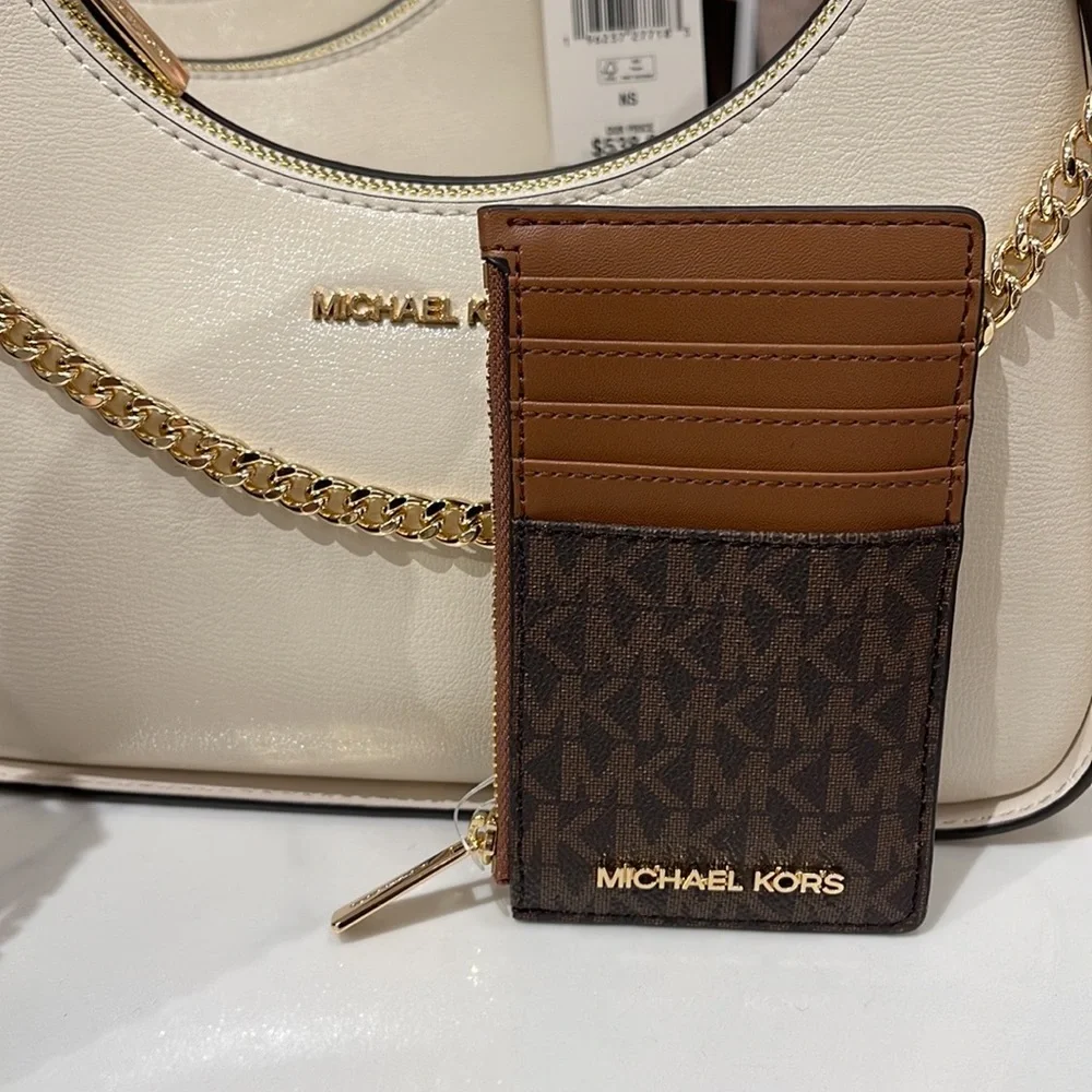 Michael Kors Jet Set Travel Medium Top Zip Card Case Wallet
PVC Leathr
Brown
NWT_7